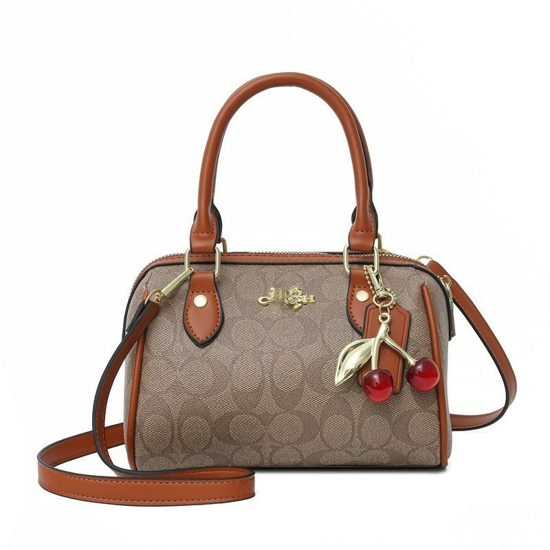 Mini Rowan Crossbody Bag In Signature Canvas